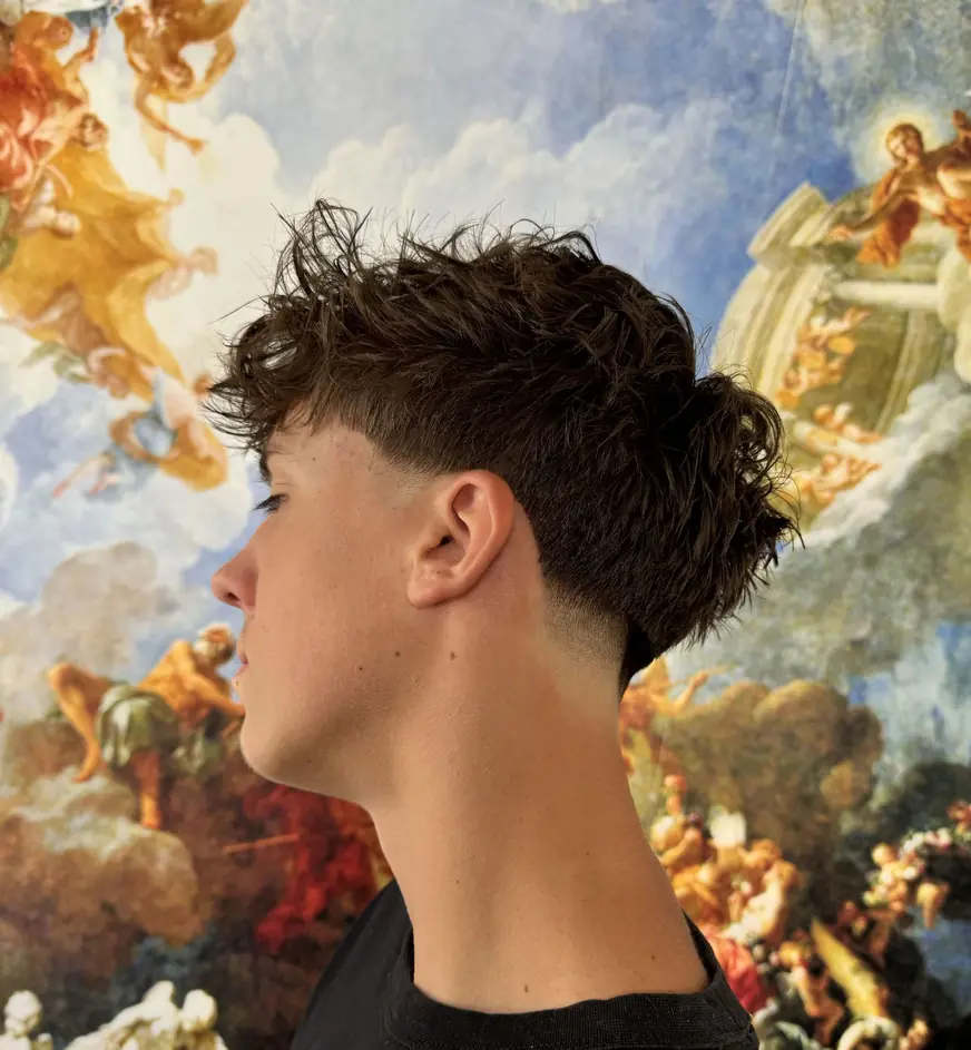 Kręcony mullet z fadem — strzyżenie w QUCCUT Barber Krosno